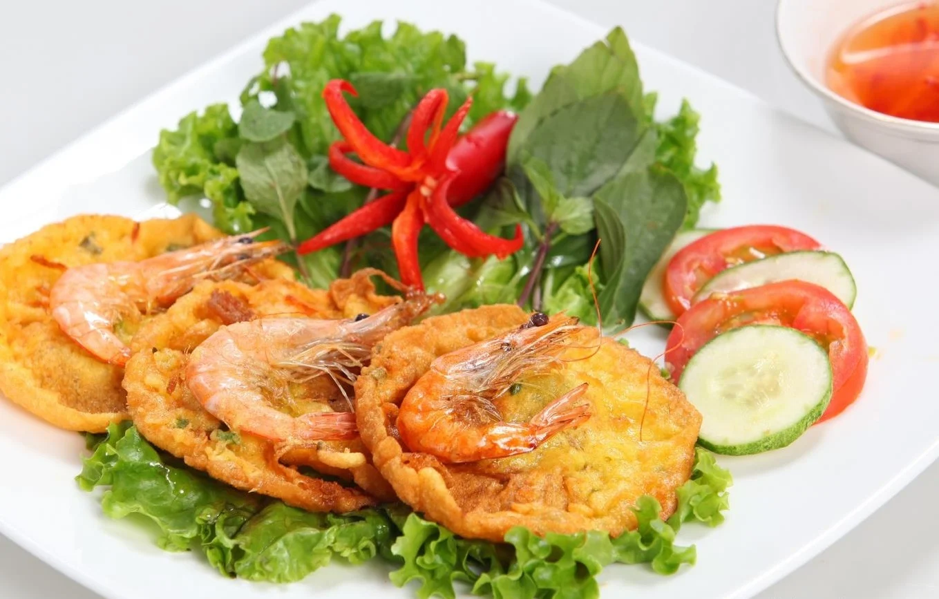 Banh Gia Go Cong: The Fritter With Its Own Folk Verse