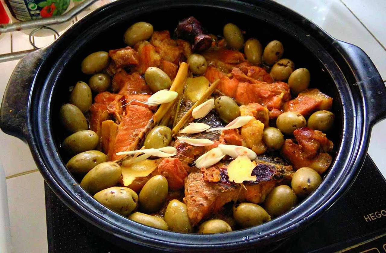 Ca Kho Tram: The Braised Fish That Needs a Fruit No Other Province Has
