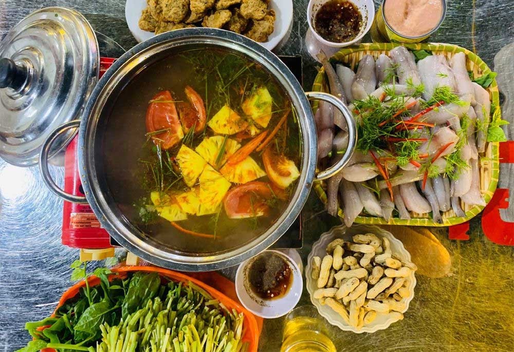The after-cave supper: why a Quang Binh fish hotpot ends a caving day best