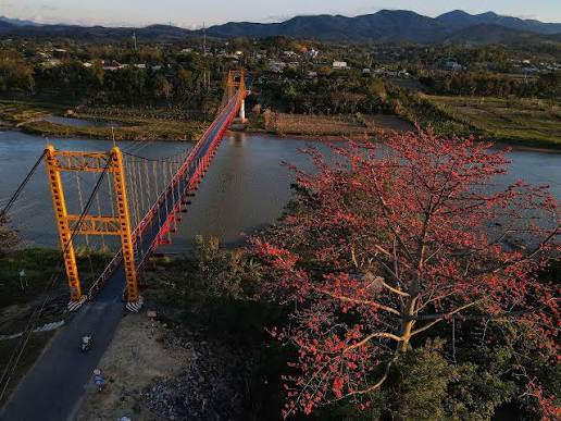 Kon Klor Bridge and the Bahnar Communal Houses