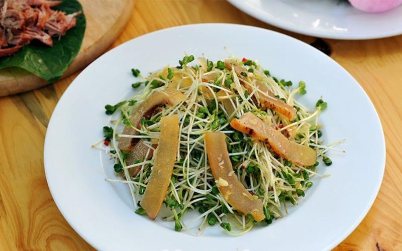 The Feast Opener: Buffalo Skin Salad on the Village Banquet Table