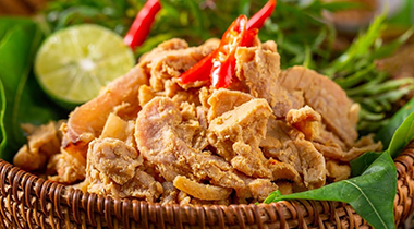 Thanh Son thit chua — the Muong people's tangy pork in a bamboo tube